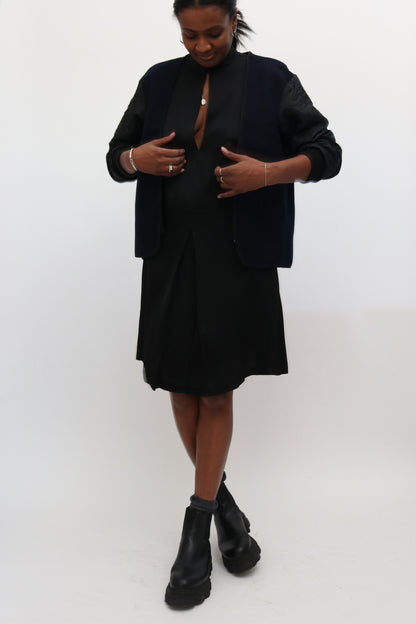 RENT: TOTÊME KEYHOLE BLACK MINI DRESS — from £33.75 per week